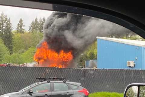 Crews battle large structure fire at scrap metal facility in south Bremerton